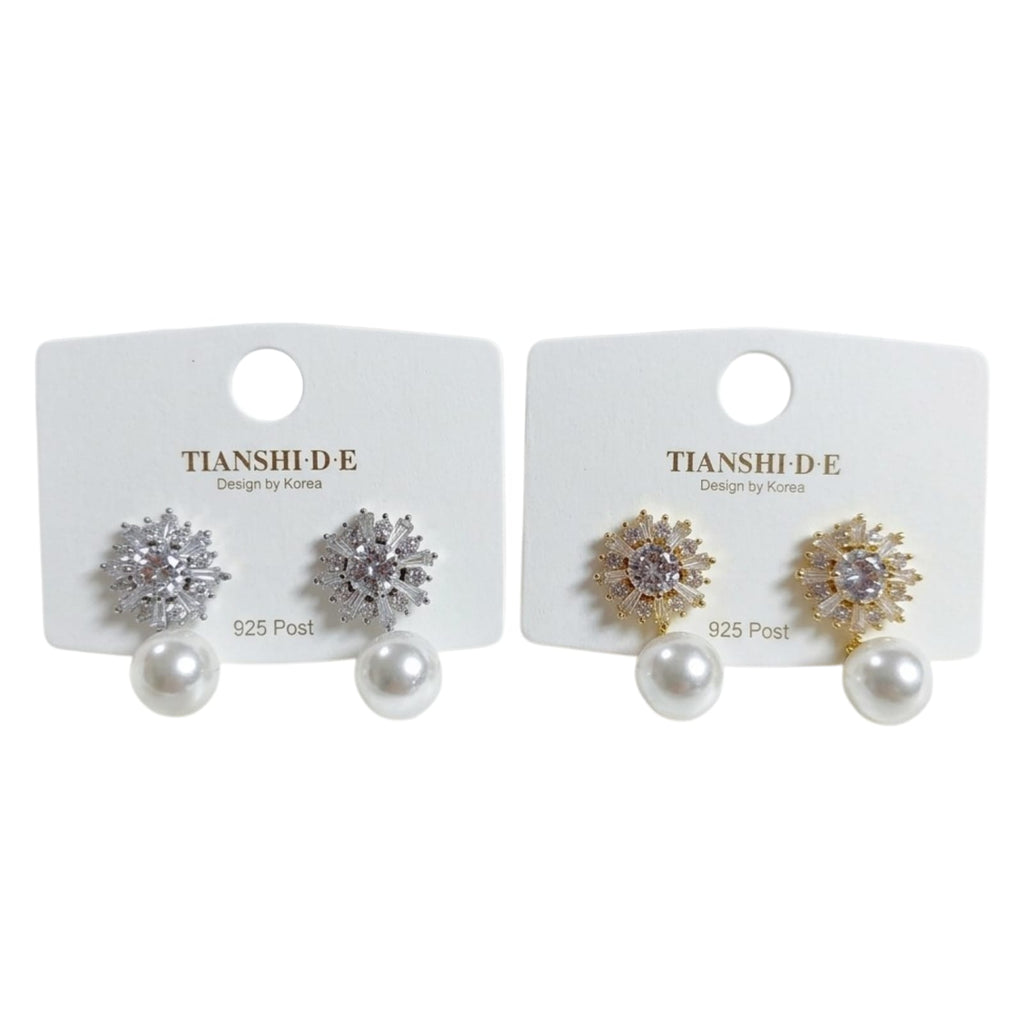 Aretes, diseño copo y perla, pin plata 925