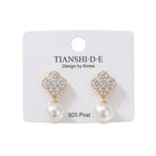 Aretes, diseño copo y perla, pin plata 925