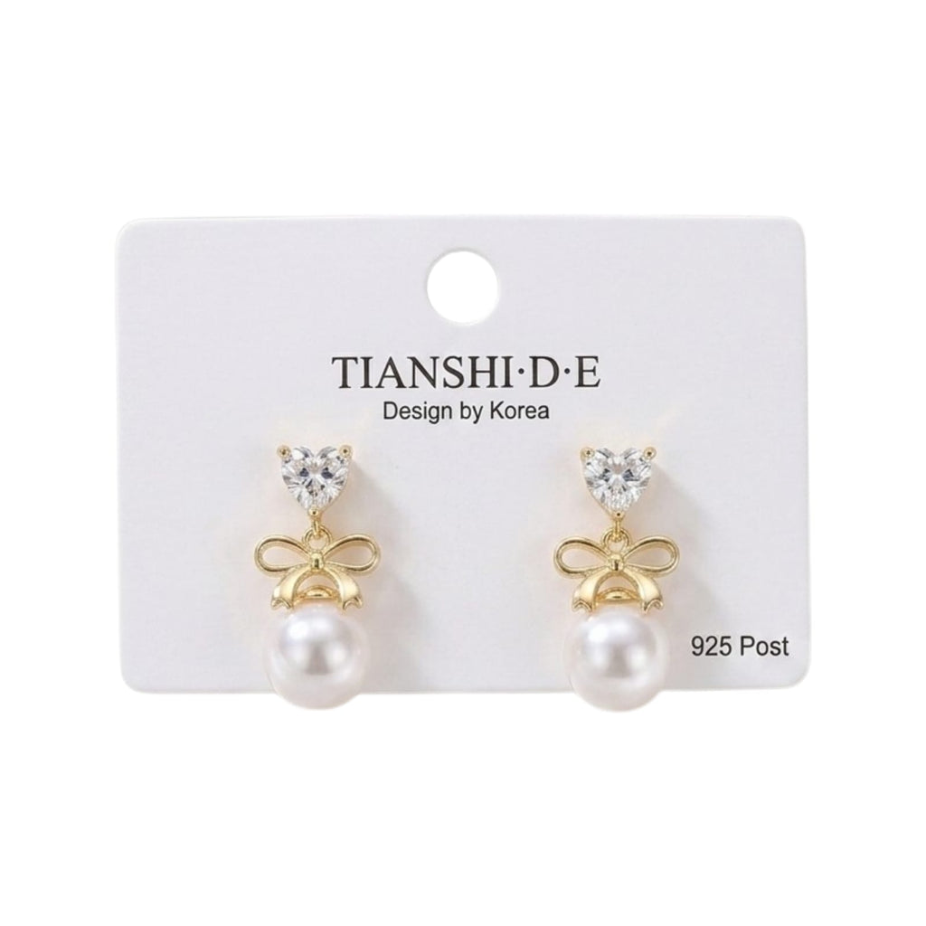 Aretes, estilo lazo con perla, pin plata 925